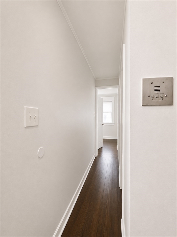 746 Broadway, Unit 2 Chelsea, MA 02150 - Photo 5 of 13 a view of a hallway with wooden floor