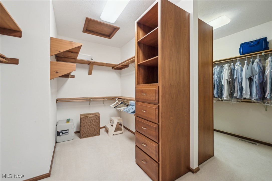 43301 Parsons Road Oberlin, OH 44074 - Photo 20 of 47 Spacious closet with attic access, light colored carpet, and visible vents