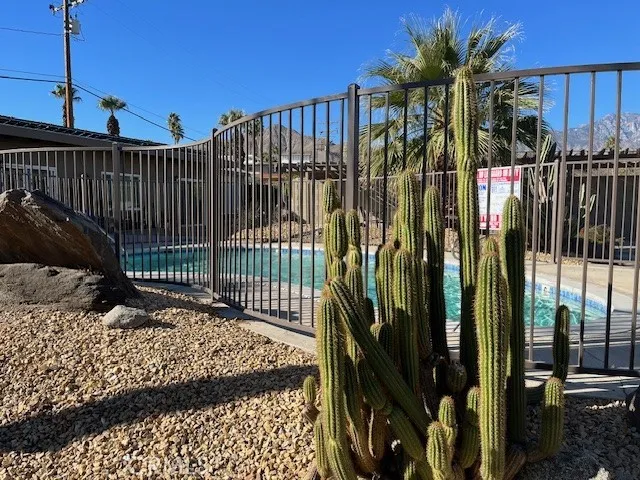 a view of street from balcony