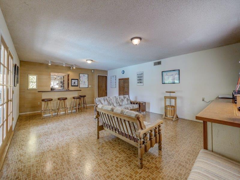 224 Circle Drive Ben Lomond, CA 95005 - Photo 12 of 34 a bedroom with furniture and a wooden floor