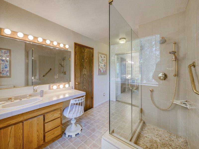 224 Circle Drive Ben Lomond, CA 95005 - Photo 17 of 34 a bathroom with a double vanity sink mirror and shower