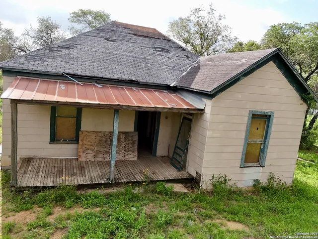 a front view of a house with garage