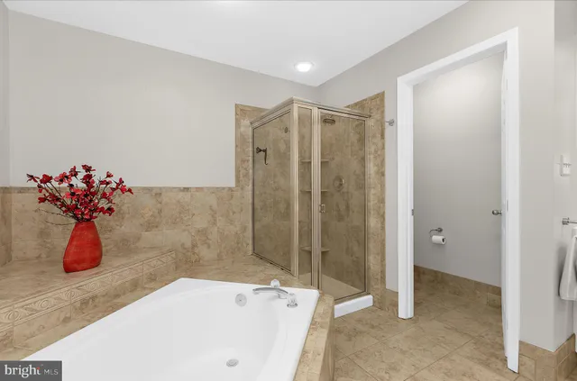 a view of a house with backyard and garden