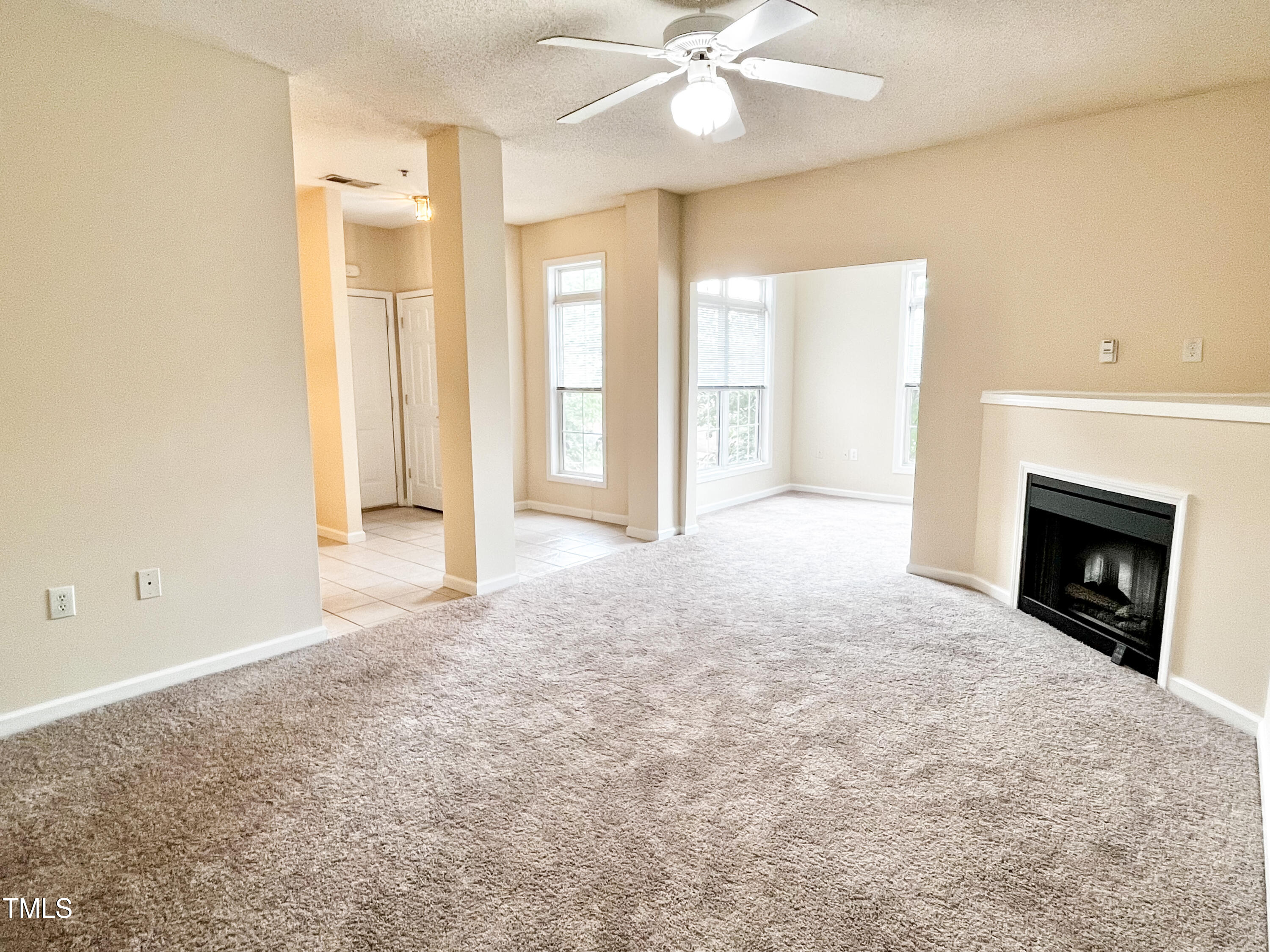 2520 Friedland Place, Unit 200 Raleigh, NC 27617 - Photo 7 of 30 LR into Kitchen