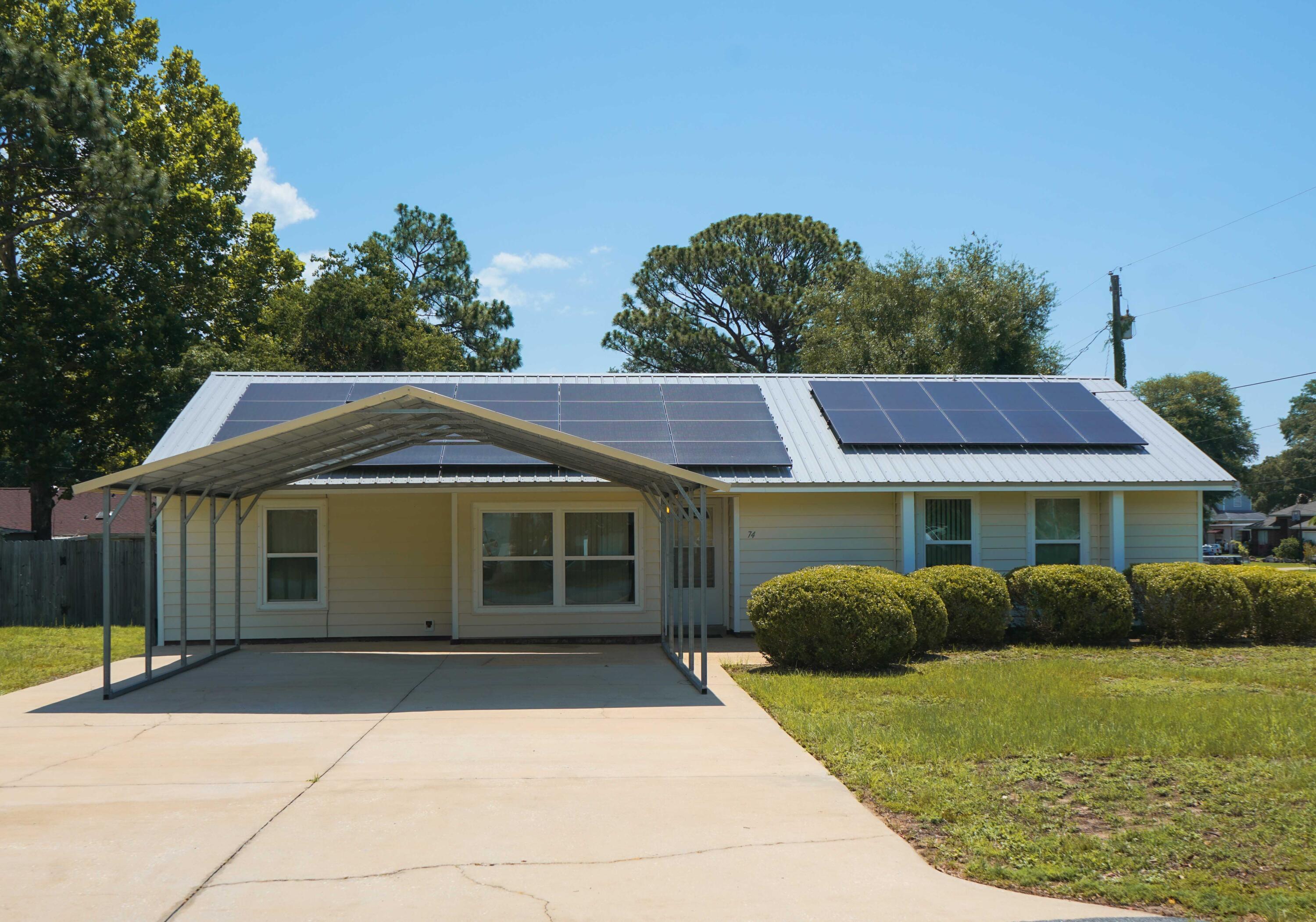 74 8th Street Shalimar, FL 32579 - Photo 2 of 26 a view of a house with a garden