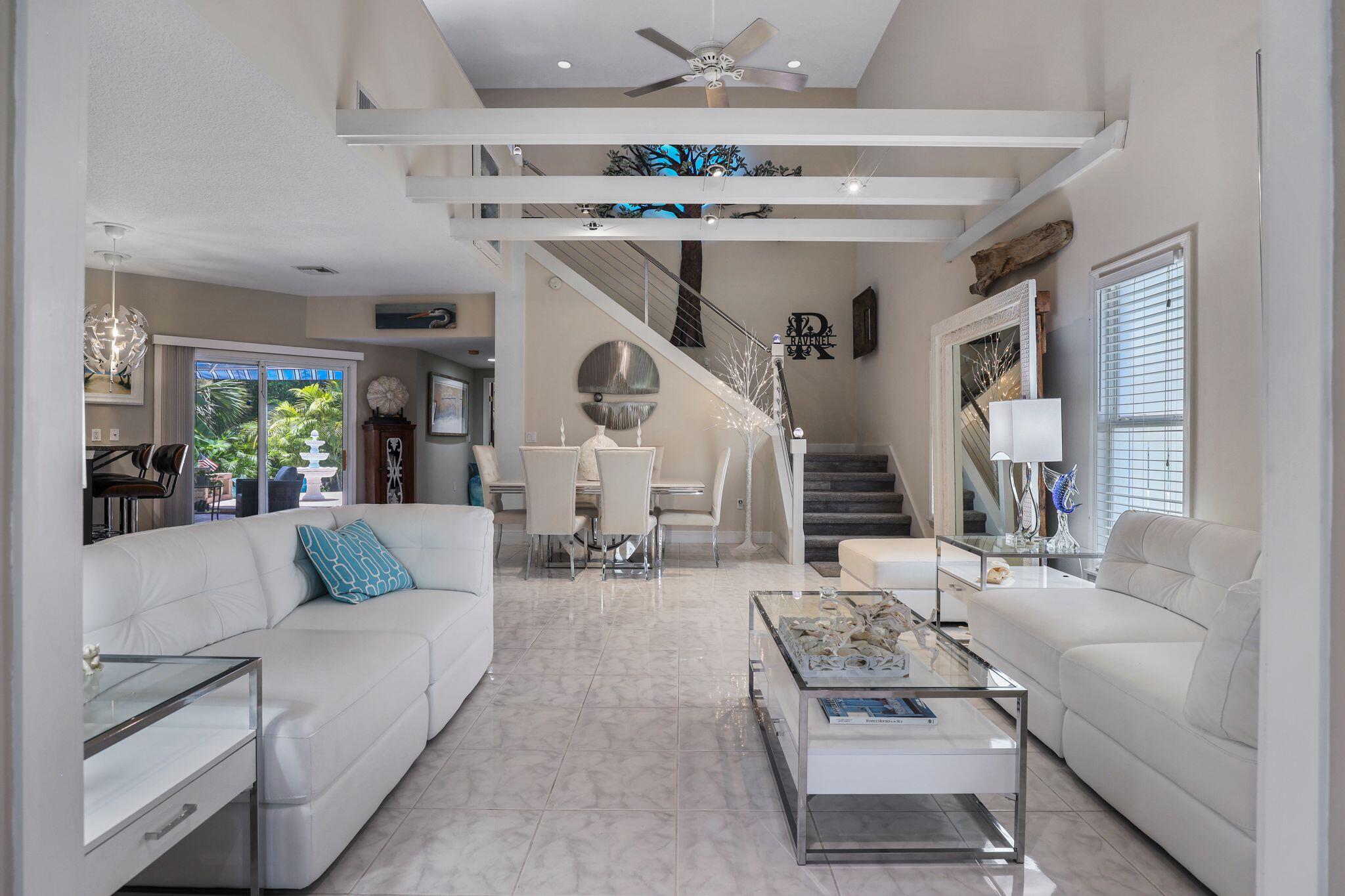 503 Hernando Street Fort Pierce, FL 34949 - Photo 12 of 96 a living room with furniture and a large window