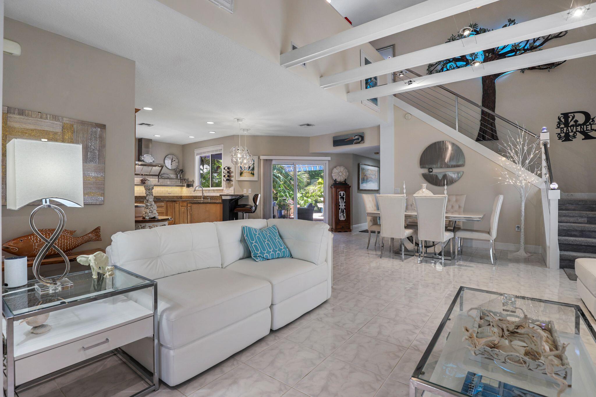 503 Hernando Street Fort Pierce, FL 34949 - Photo 13 of 96 a living room with furniture and a clock