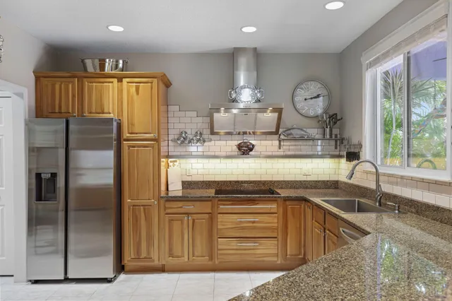 a bathroom with a sink vanity and a mirror