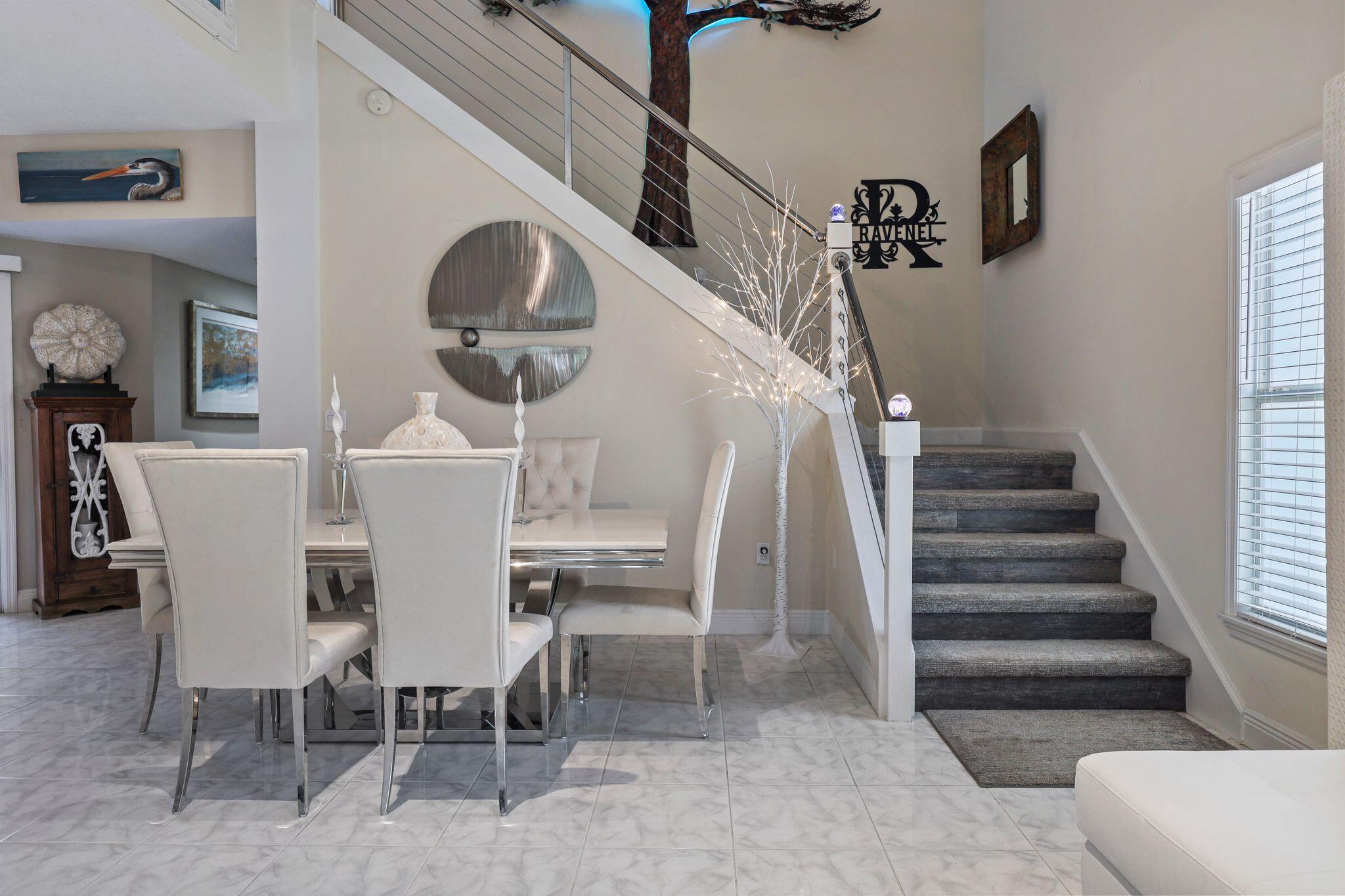 503 Hernando Street Fort Pierce, FL 34949 - Photo 35 of 96 a view of a dining room with furniture and wooden floor
