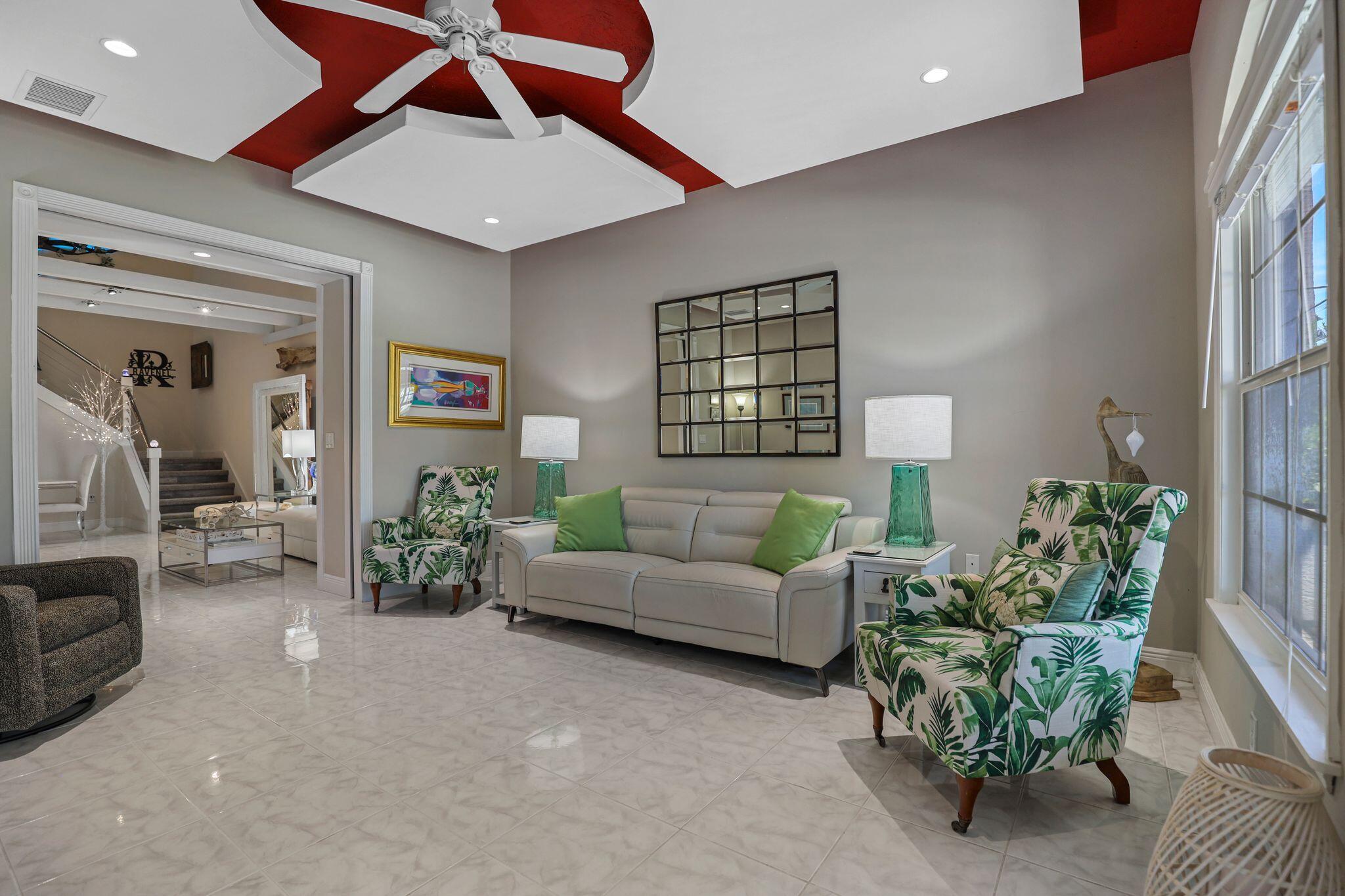 503 Hernando Street Fort Pierce, FL 34949 - Photo 6 of 96 a living room with furniture and a potted plant