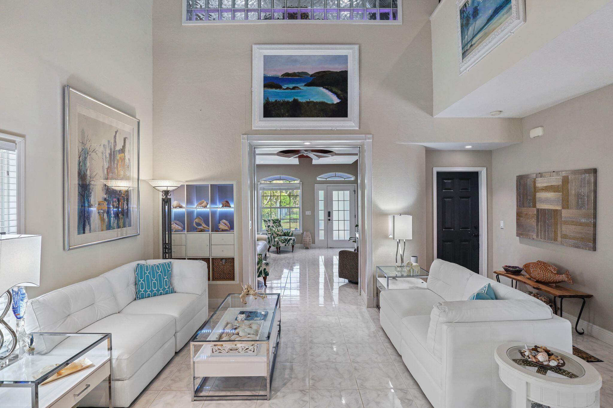 503 Hernando Street Fort Pierce, FL 34949 - Photo 9 of 96 a living room with furniture and a flat screen tv