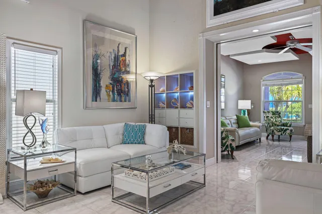 a bathroom with a granite countertop toilet a sink and mirror