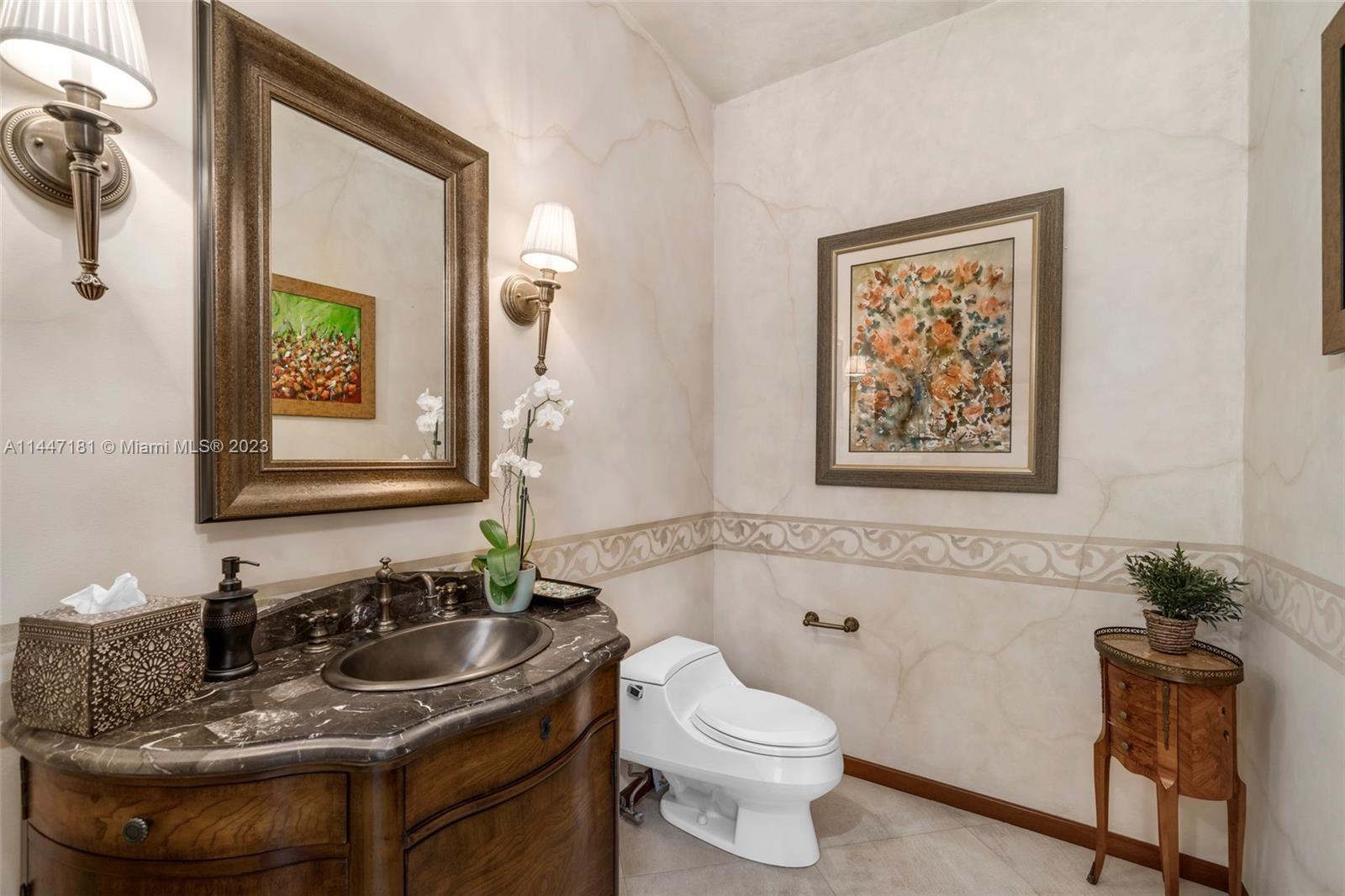 4875 Southwest 80th Street Miami, FL 33143 - Photo 20 of 52 a bathroom with a granite countertop sink and a mirror