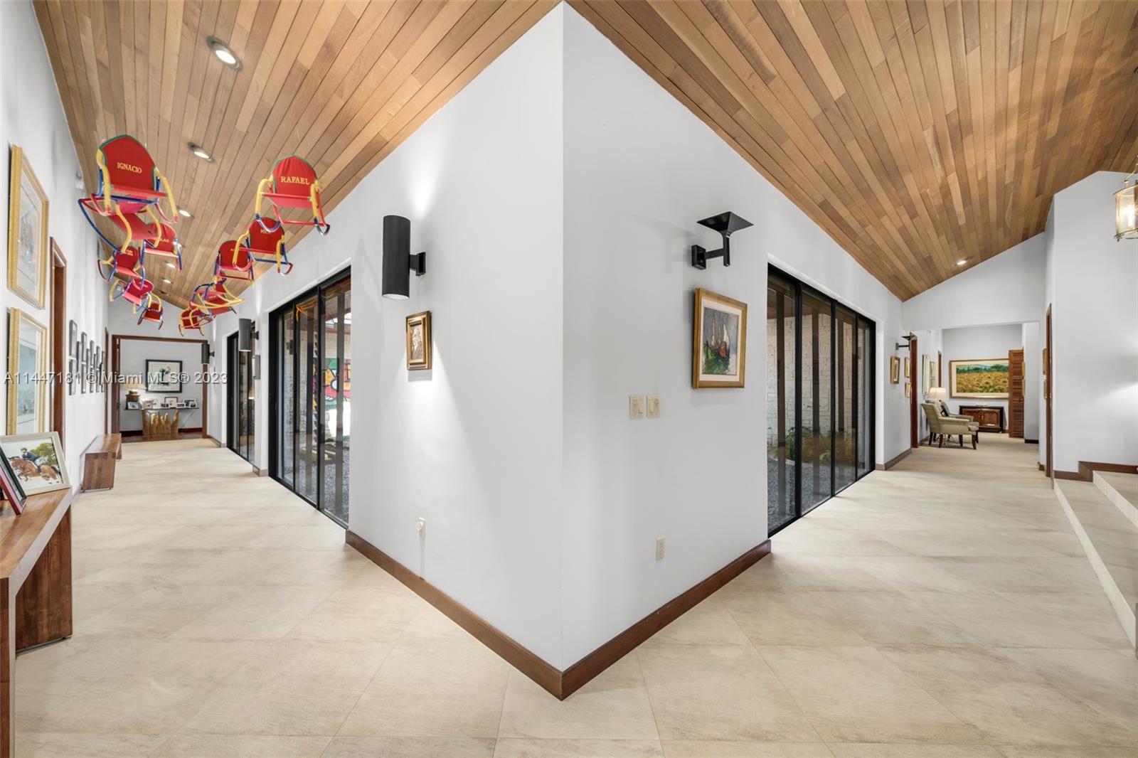 4875 Southwest 80th Street Miami, FL 33143 - Photo 21 of 52 a hall way with furniture