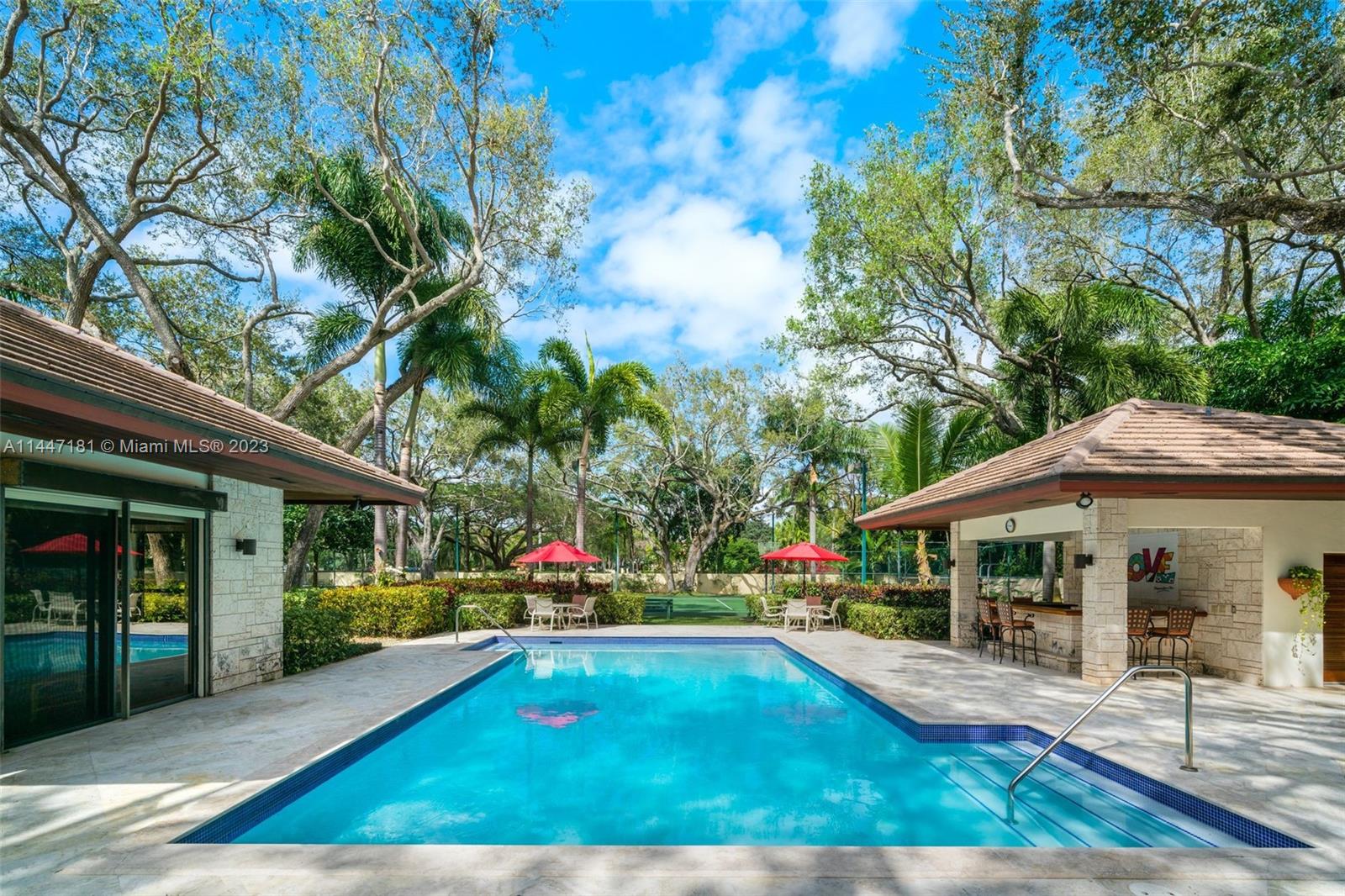 4875 Southwest 80th Street Miami, FL 33143 - Photo 37 of 52 a view of the house with porch and furniture
