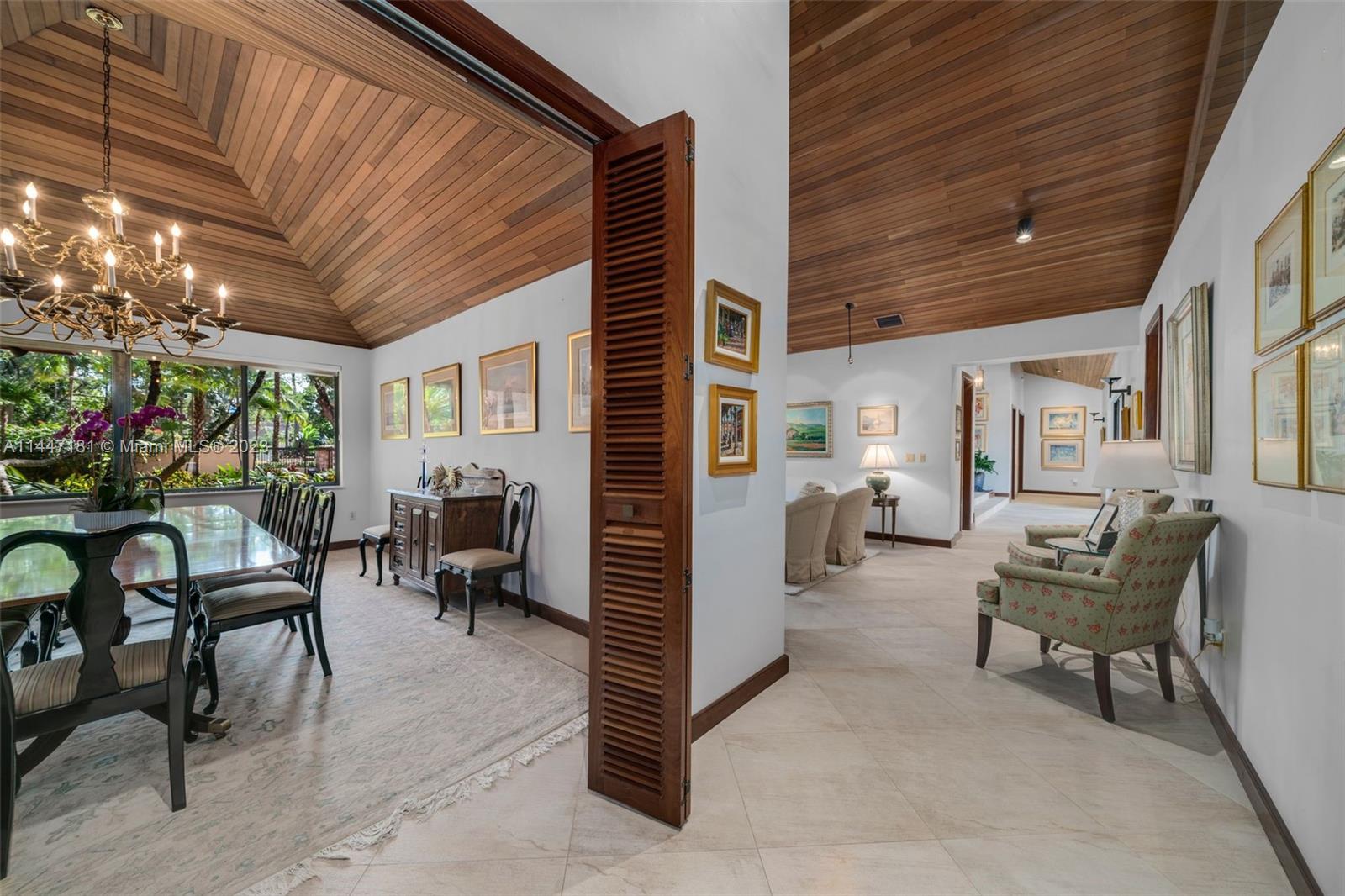 4875 Southwest 80th Street Miami, FL 33143 - Photo 10 of 52 a view of living room filled with furniture and a potted plant