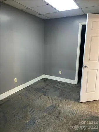 a room with a table and chairs