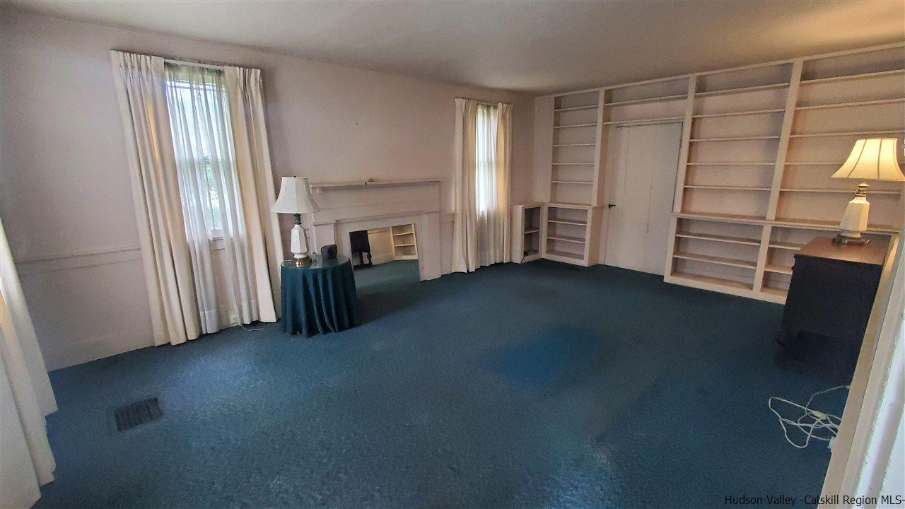 3596 Main Street Stone Ridge, NY 12484 - Photo 6 of 20 a view of a room with stairs and a window