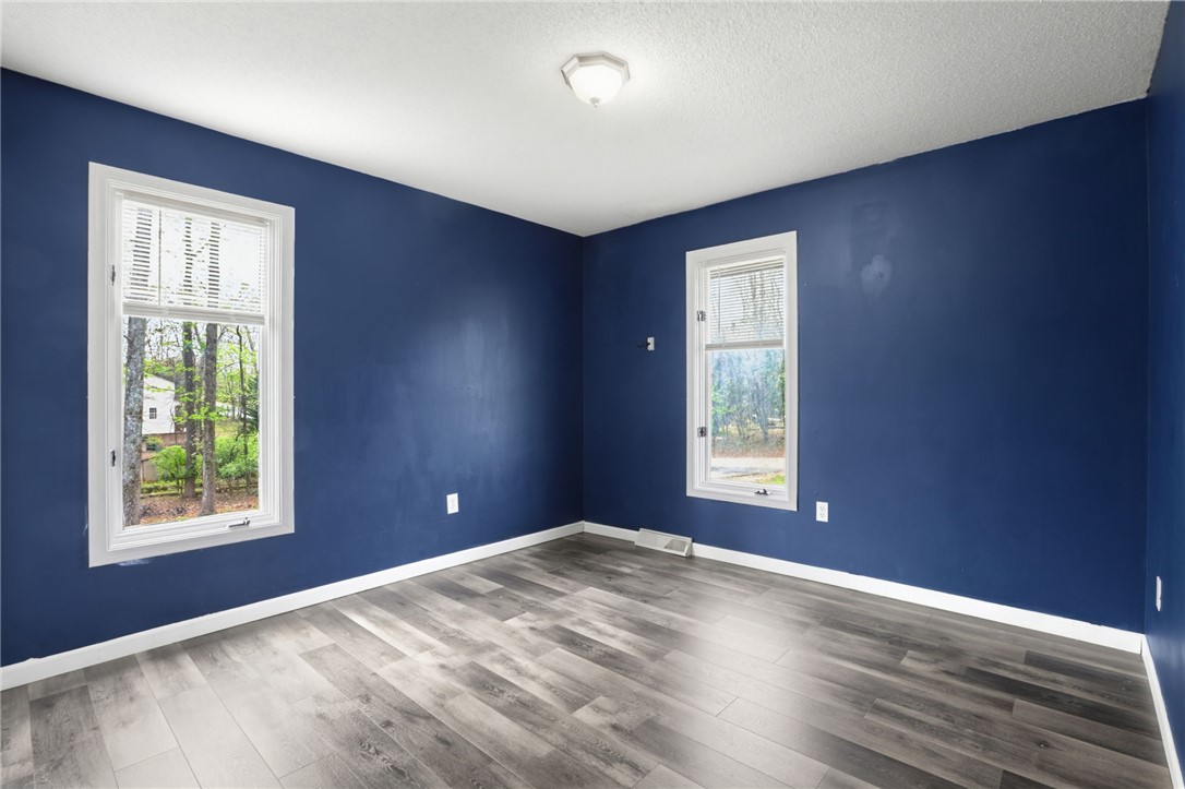 137 Towne Creek Trail Anderson, SC 29621 - Photo 12 of 23 Bedroom 2 - This versatile room features durable flooring and ample natural light, perfect for any use.
