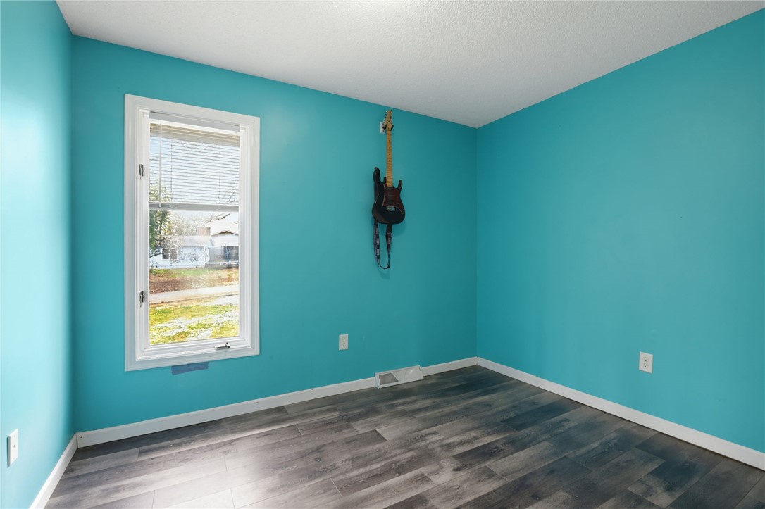 137 Towne Creek Trail Anderson, SC 29621 - Photo 15 of 23 This cozy room offers a tranquil atmosphere with its vibrant walls and durable flooring.
