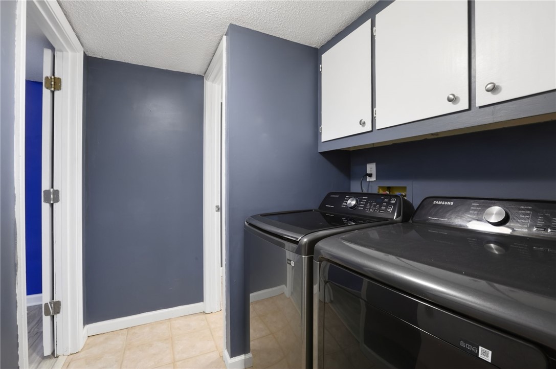 137 Towne Creek Trail Anderson, SC 29621 - Photo 19 of 23 This dedicated laundry room provides essential functionality for household tasks.
