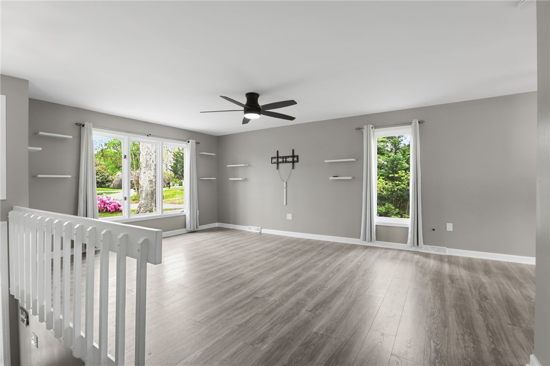 137 Towne Creek Trail Anderson, SC 29621 - Photo 3 of 23 This bright living space features abundant natural light and versatile flooring, creating an inviting atmosphere.