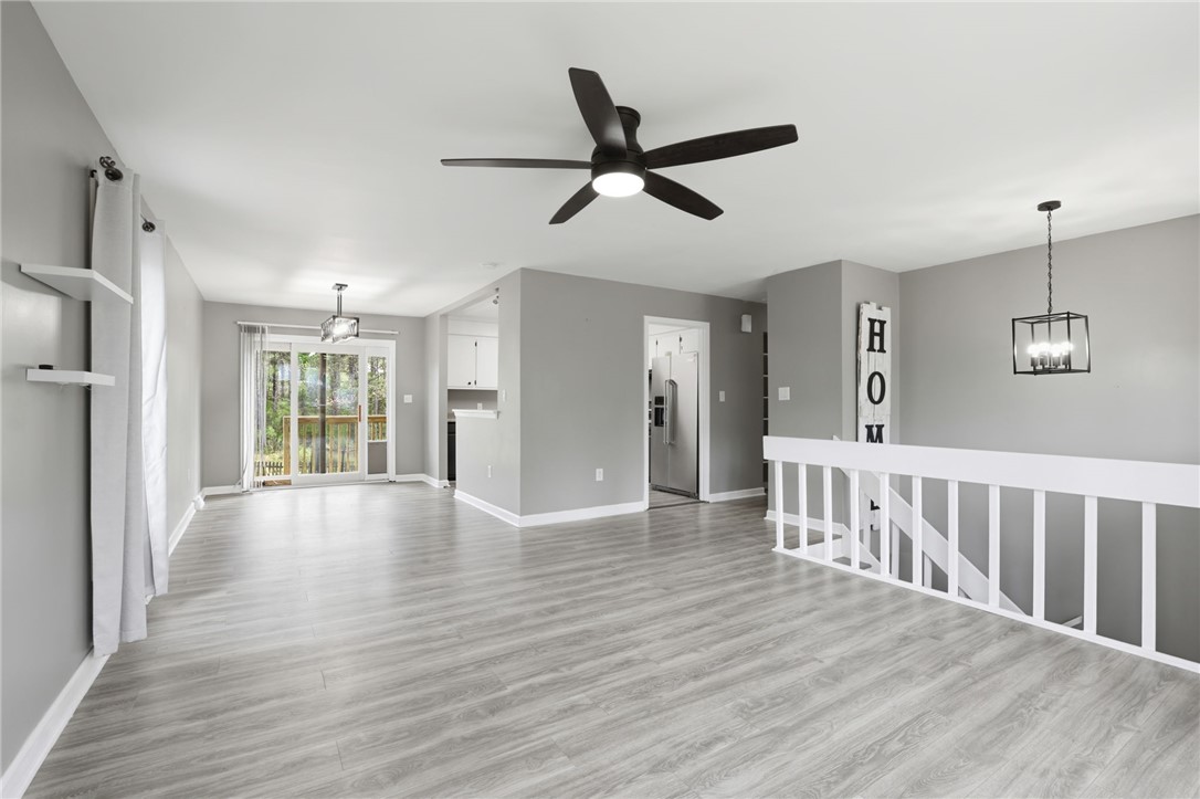 137 Towne Creek Trail Anderson, SC 29621 - Photo 5 of 23 This bright and airy living space features modern flooring and an open layout for comfortable living.