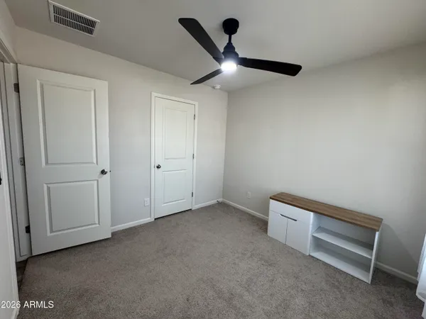 a view of room with air conditioner and window