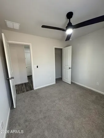 a view of a livingroom with wooden floor