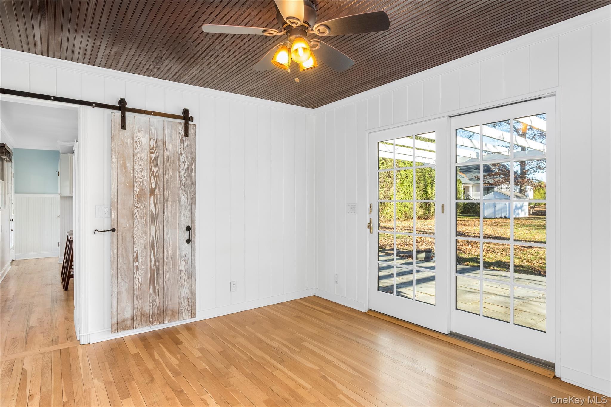 56 Seaman Road Riverhead, NY 11901 - Photo 4 of 9 a view of empty room with windows