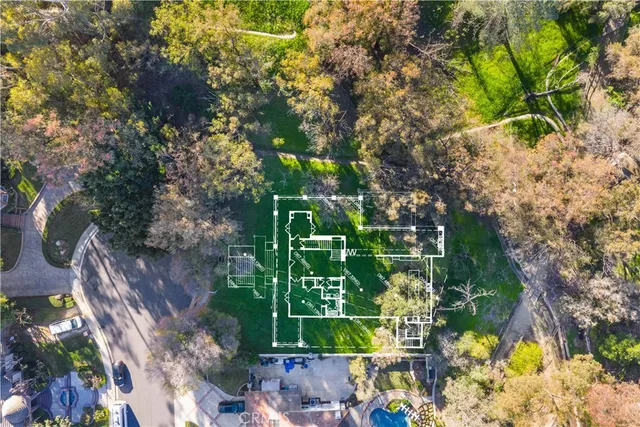 a backyard of a house with lots of green space
