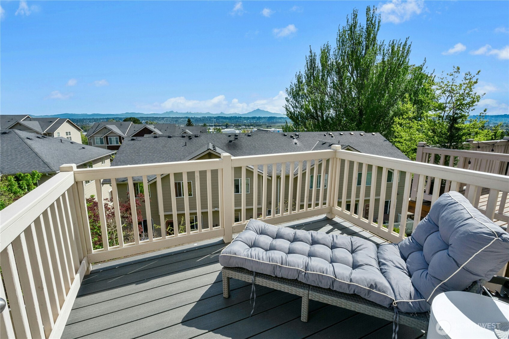 527 Pilchuck Path Everett, WA 98201 - Photo 16 of 38 a view of a chair in wooden deck