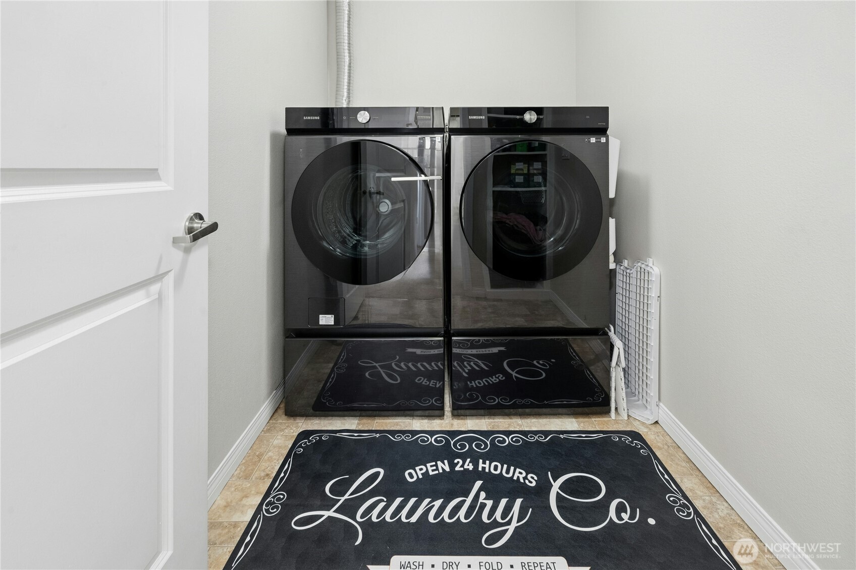 527 Pilchuck Path Everett, WA 98201 - Photo 27 of 38 a view of a washer and dryer