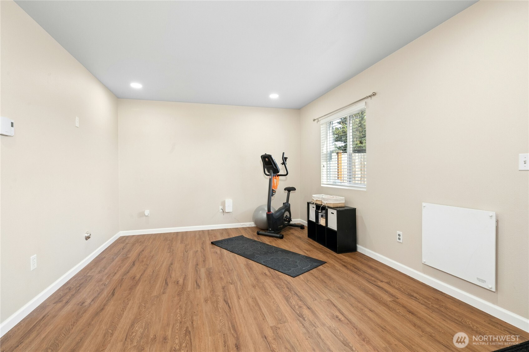 527 Pilchuck Path Everett, WA 98201 - Photo 28 of 38 a view of a room with wooden floor