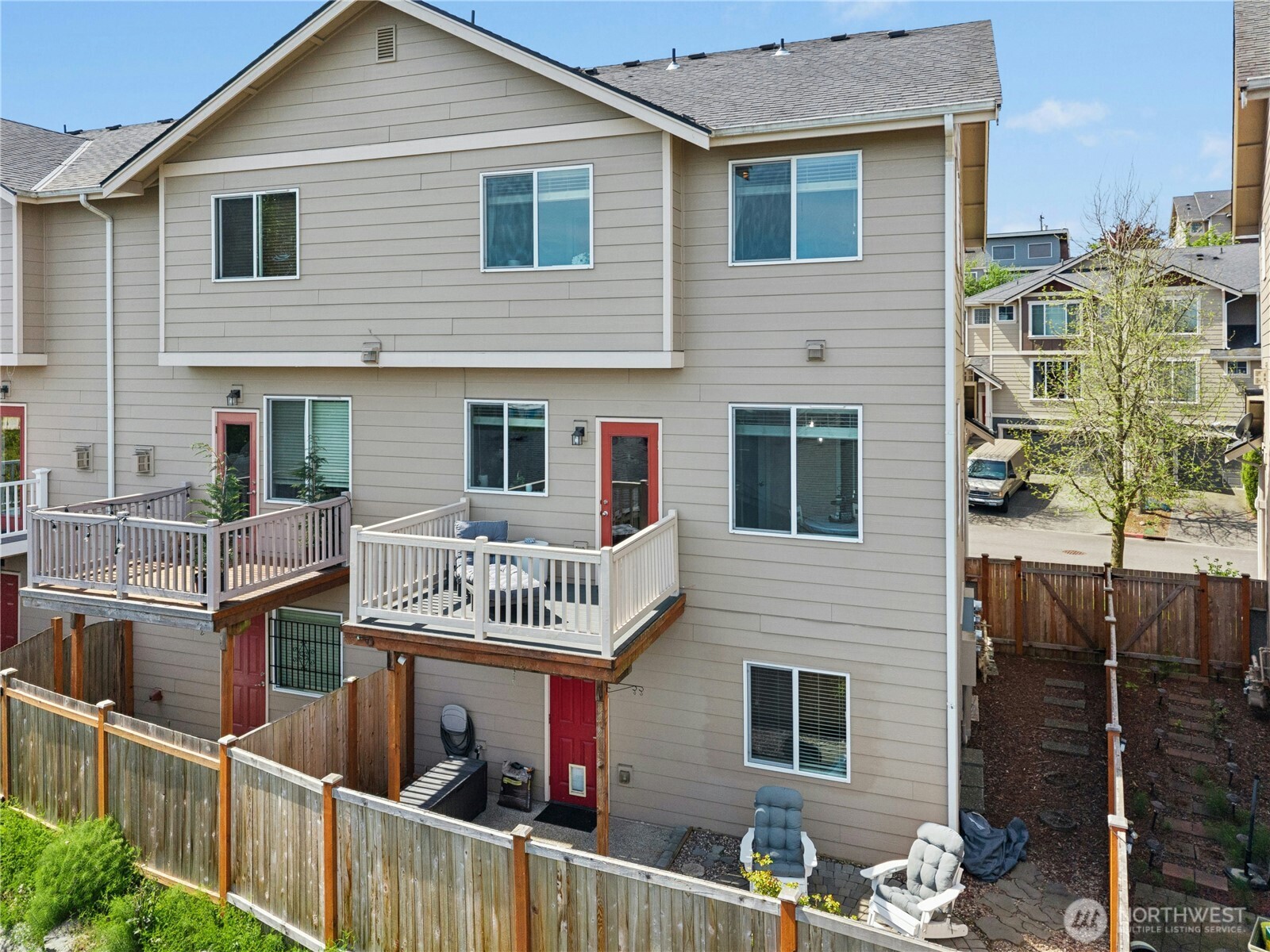 527 Pilchuck Path Everett, WA 98201 - Photo 33 of 38 a front view of a house with glass windows