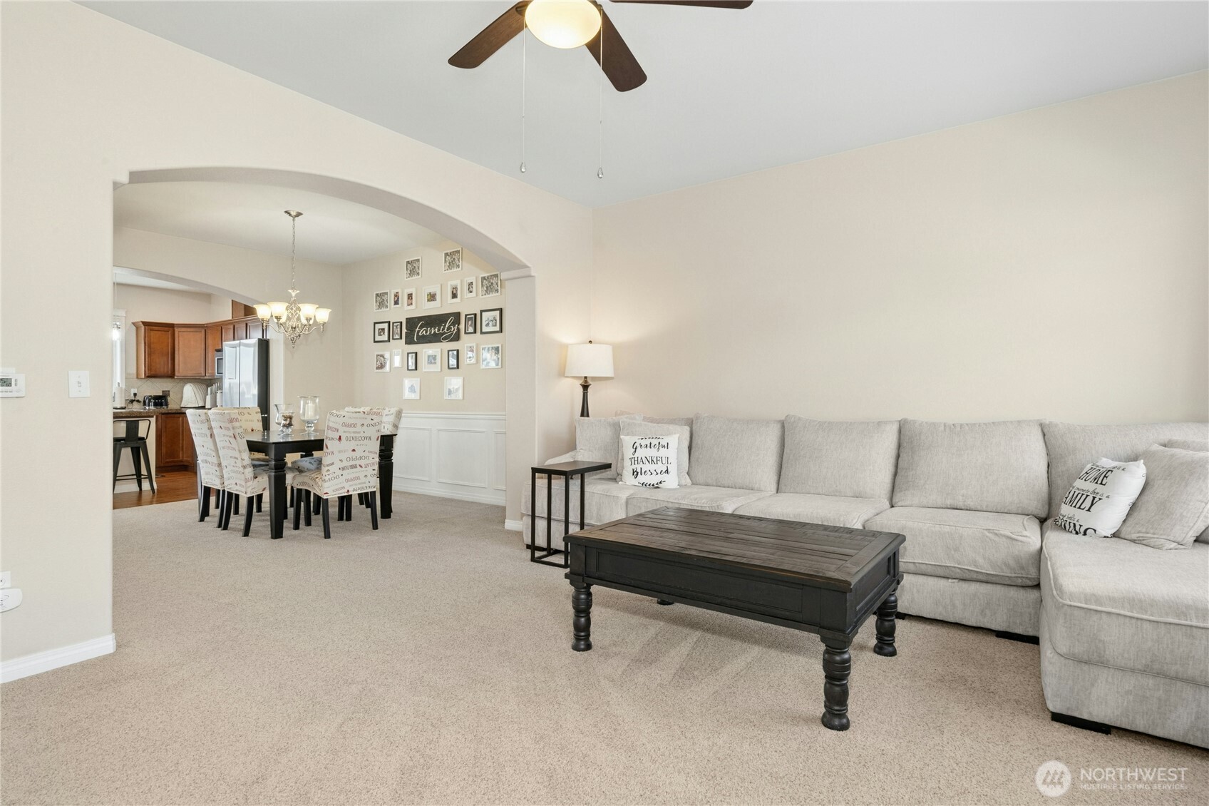 527 Pilchuck Path Everett, WA 98201 - Photo 7 of 38 a living room with furniture and a table