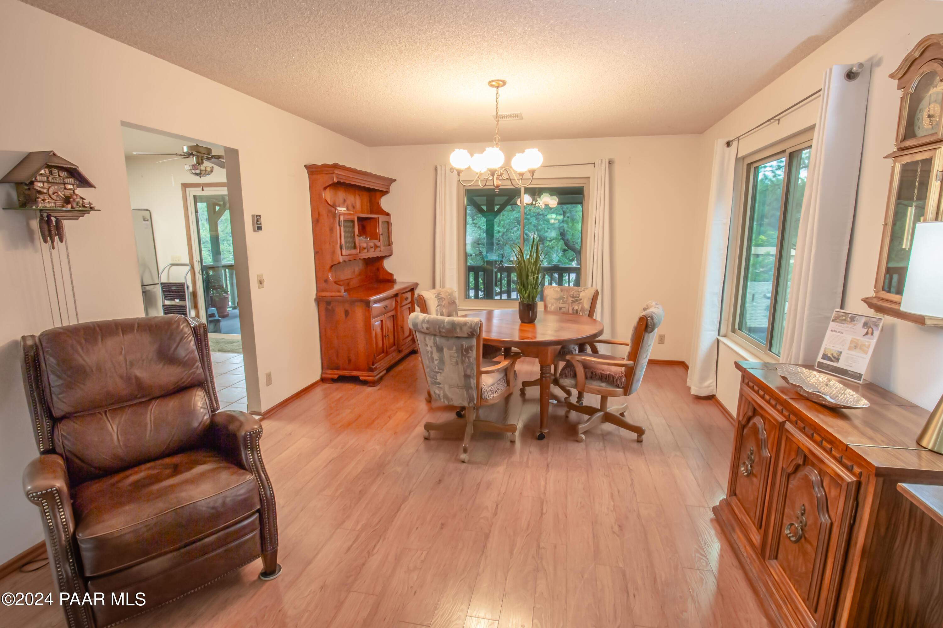 481 Turtleback Road Prescott, AZ 86303 - Photo 12 of 71 a view of a livingroom with furniture window and wooden floor