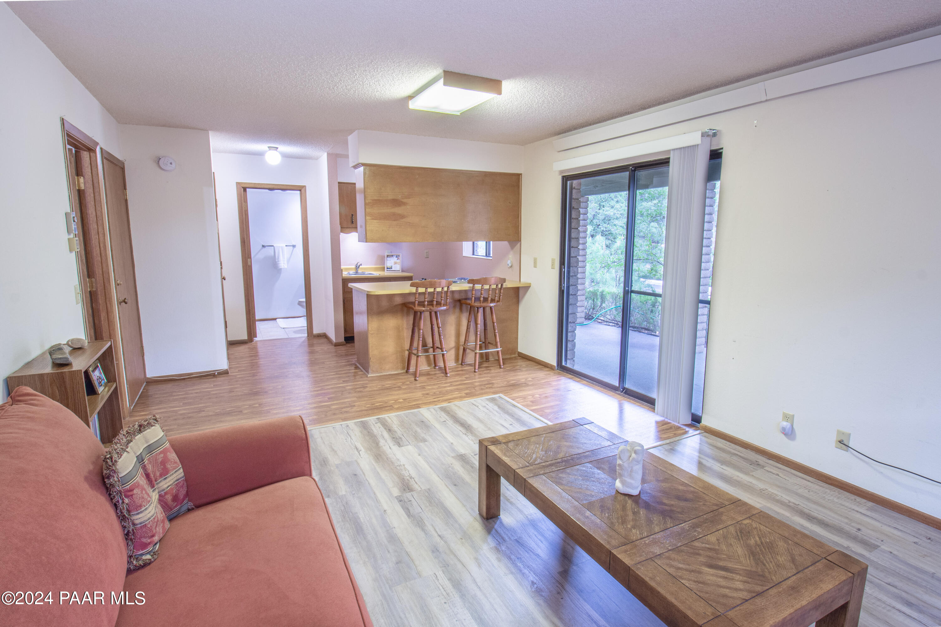 481 Turtleback Road Prescott, AZ 86303 - Photo 38 of 71 a living room with furniture and a wooden floor
