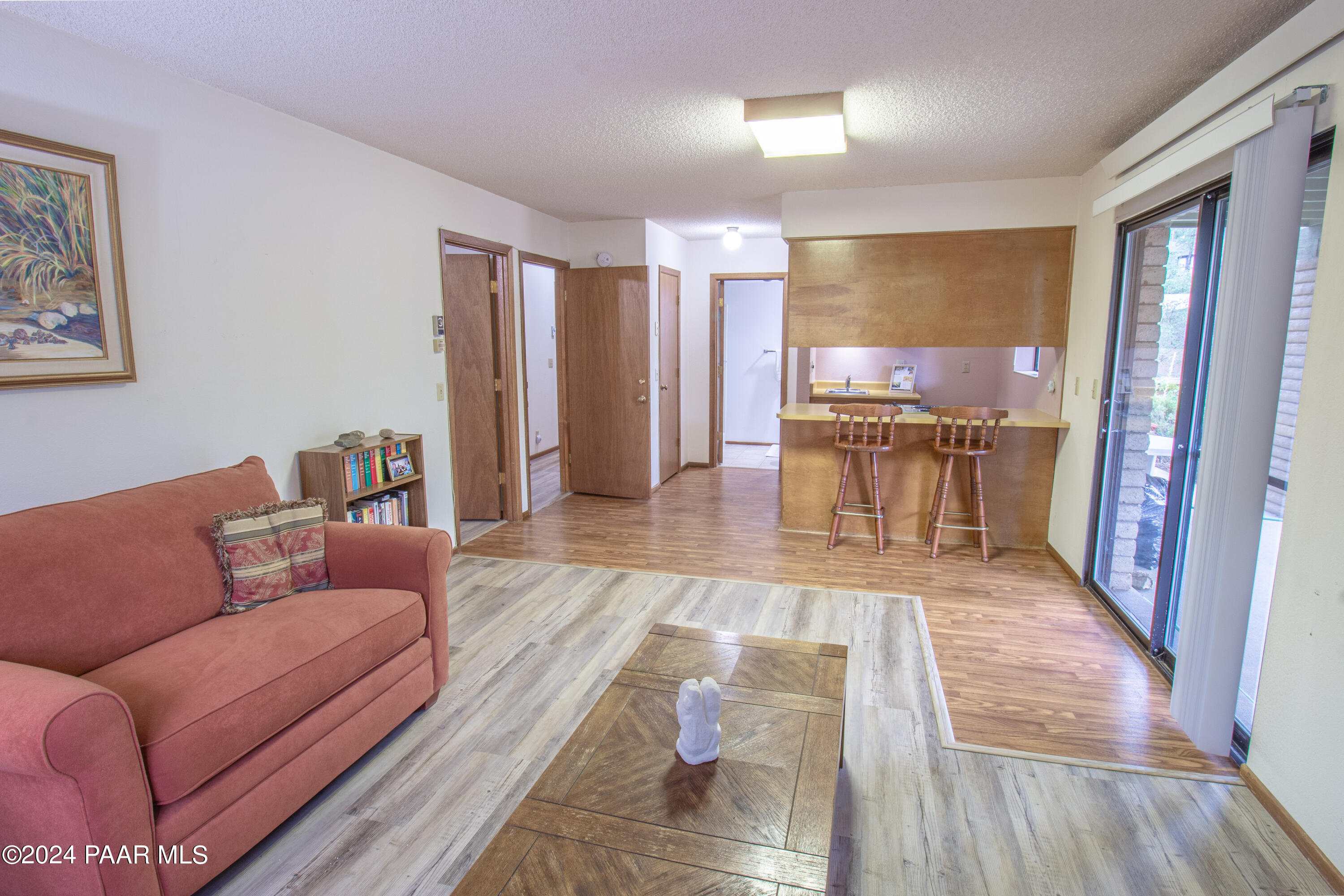 481 Turtleback Road Prescott, AZ 86303 - Photo 39 of 71 a living room with furniture and a wooden floor