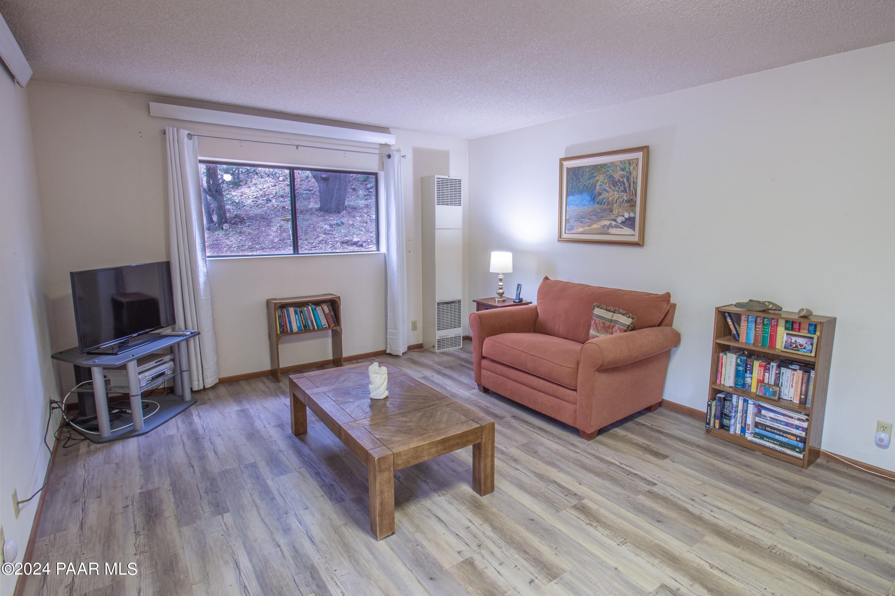 481 Turtleback Road Prescott, AZ 86303 - Photo 40 of 71 a living room with furniture and a wooden floor