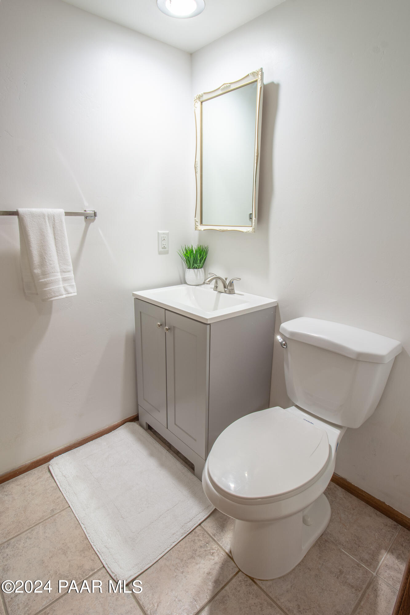 481 Turtleback Road Prescott, AZ 86303 - Photo 42 of 71 a white toilet sitting next to a bathroom sink