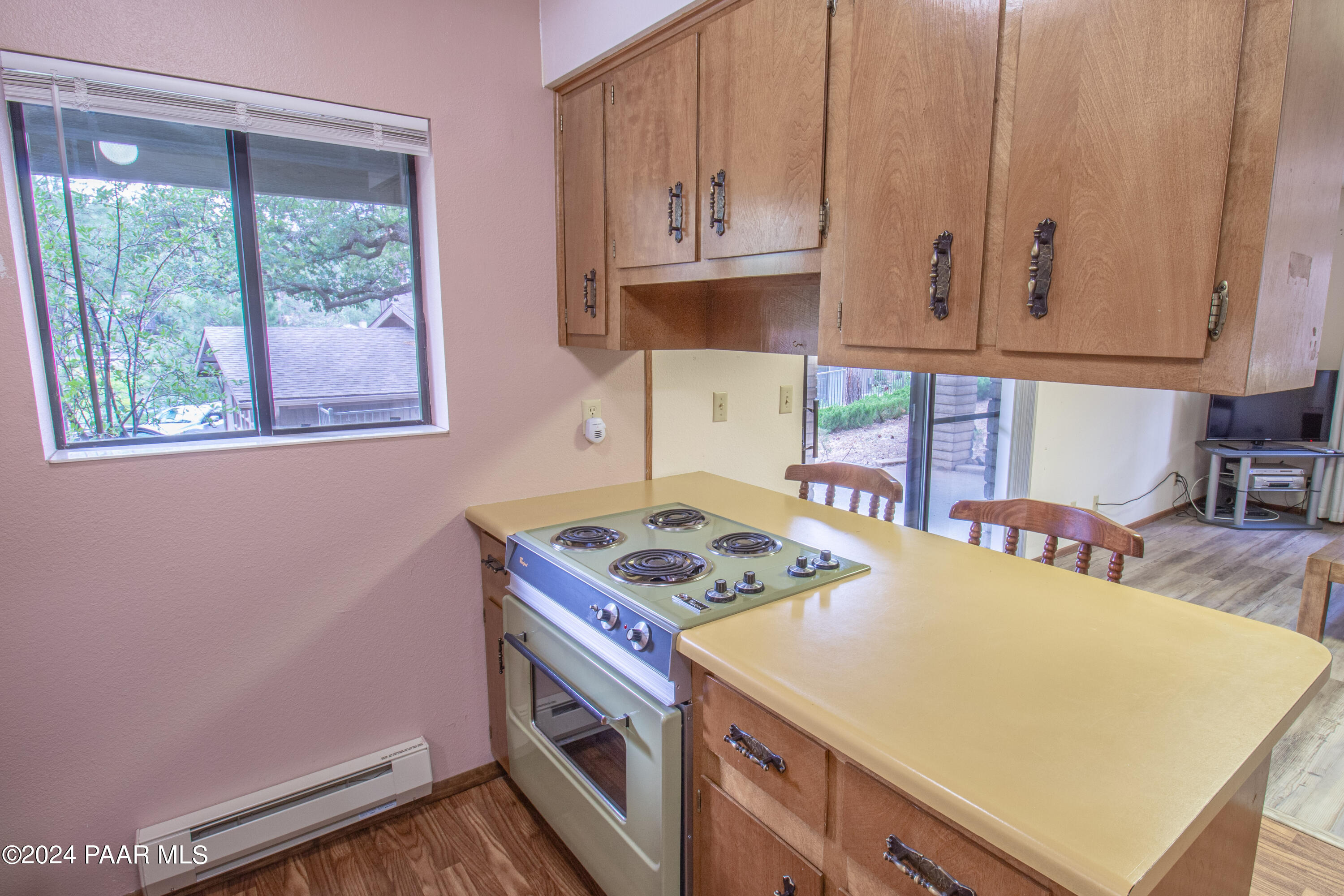 481 Turtleback Road Prescott, AZ 86303 - Photo 44 of 71 a kitchen with stainless steel appliances a stove a sink and a cabinets