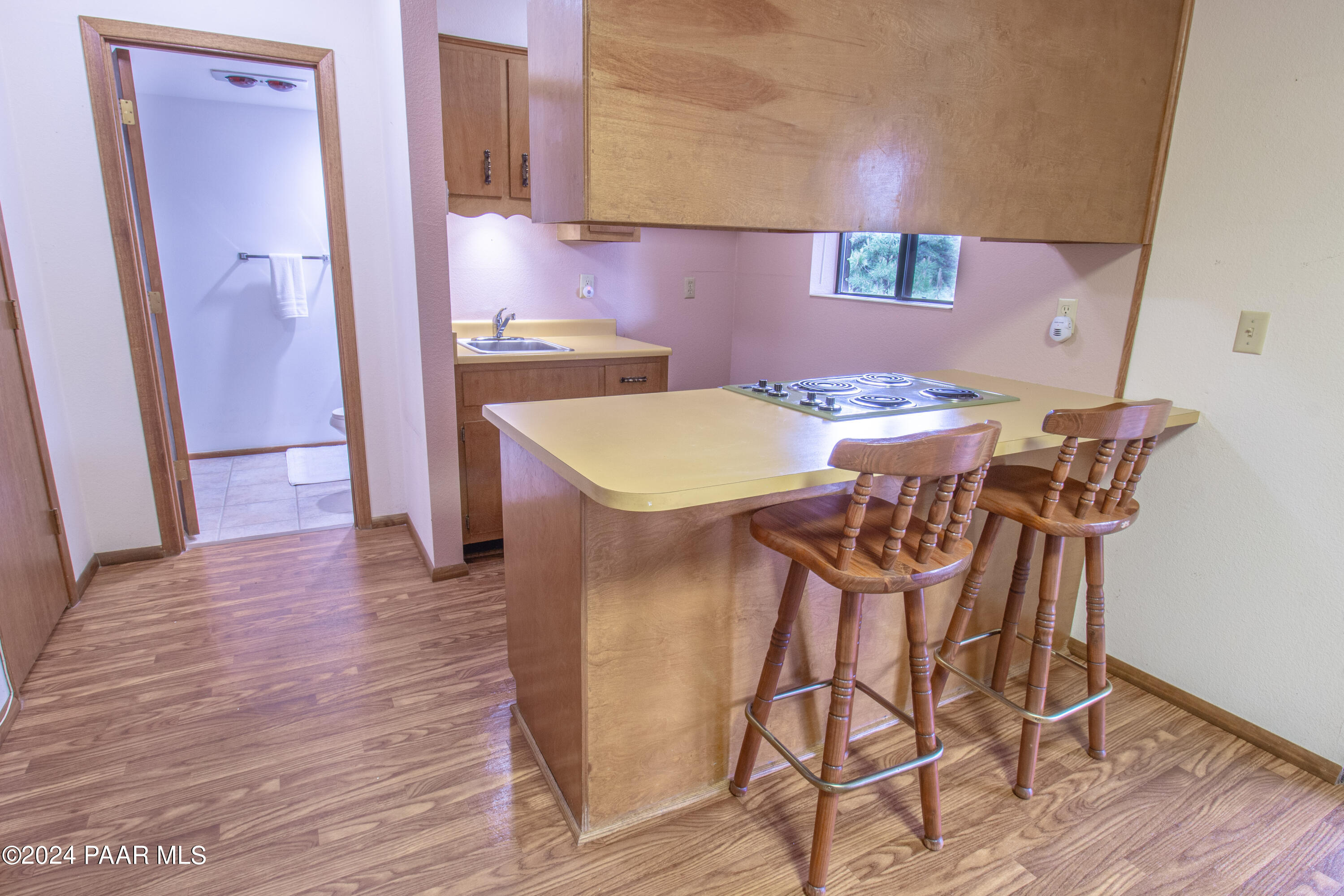 481 Turtleback Road Prescott, AZ 86303 - Photo 46 of 71 a view of a dining room with furniture and wooden floor