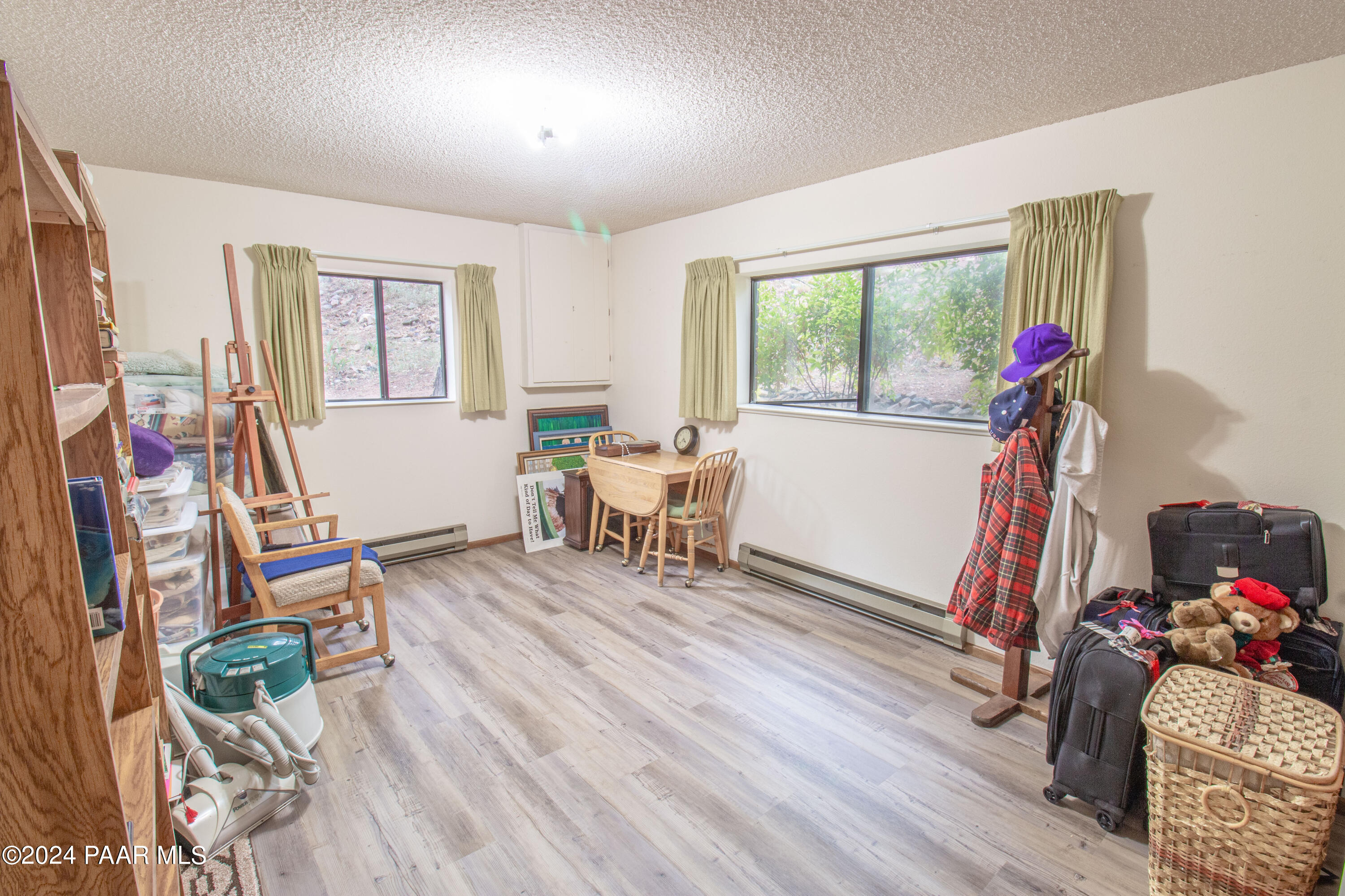 481 Turtleback Road Prescott, AZ 86303 - Photo 47 of 71 a living room with furniture and a wooden floor