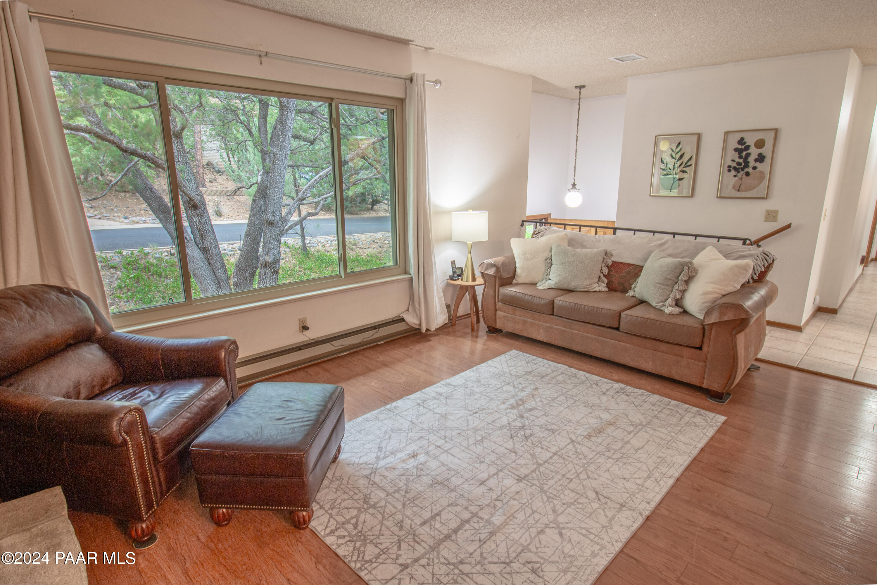 481 Turtleback Road Prescott, AZ 86303 - Photo 6 of 71 a living room with furniture and a large window