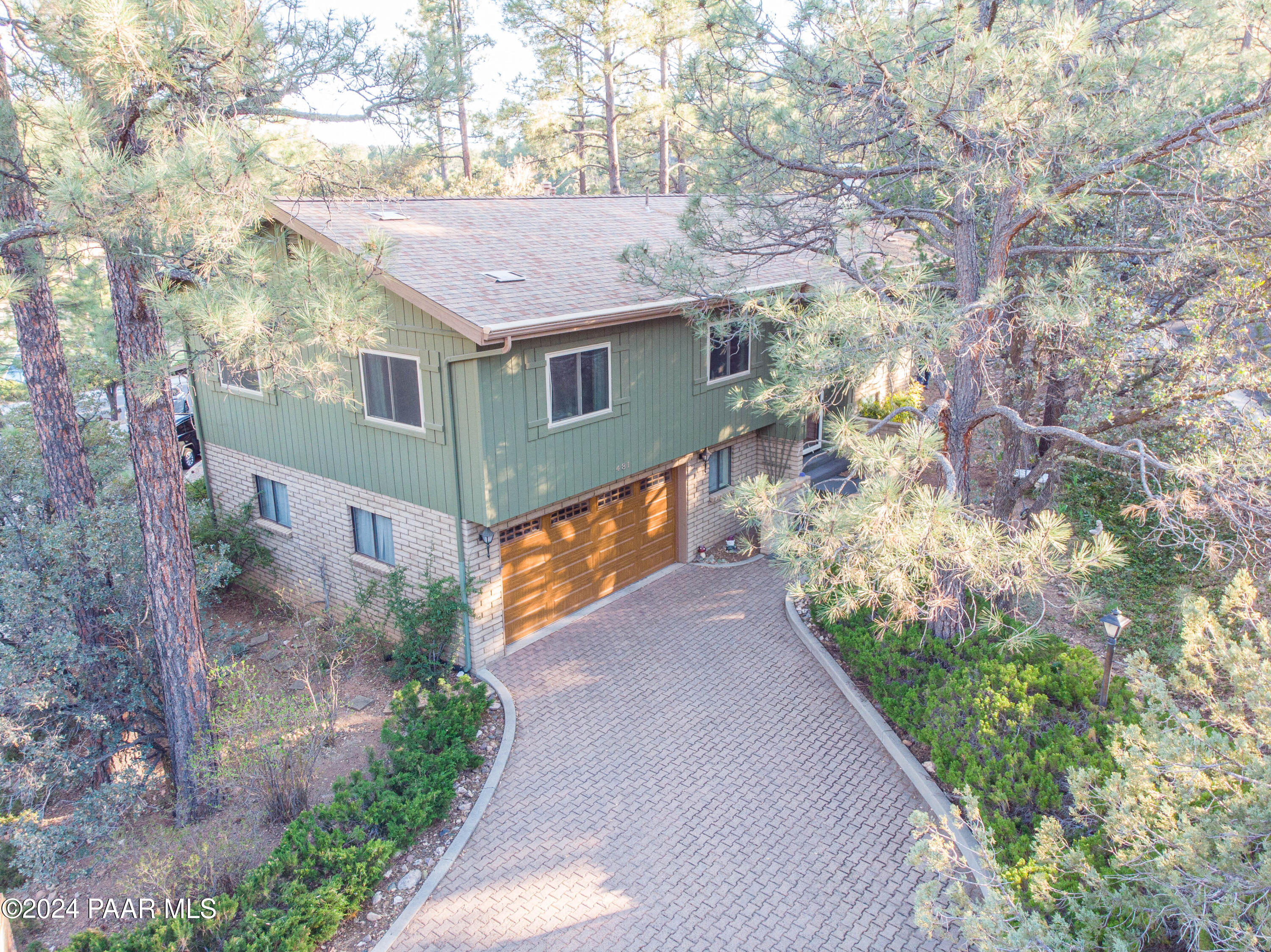 481 Turtleback Road Prescott, AZ 86303 - Photo 69 of 71 a view of a house with a yard plants and large tree