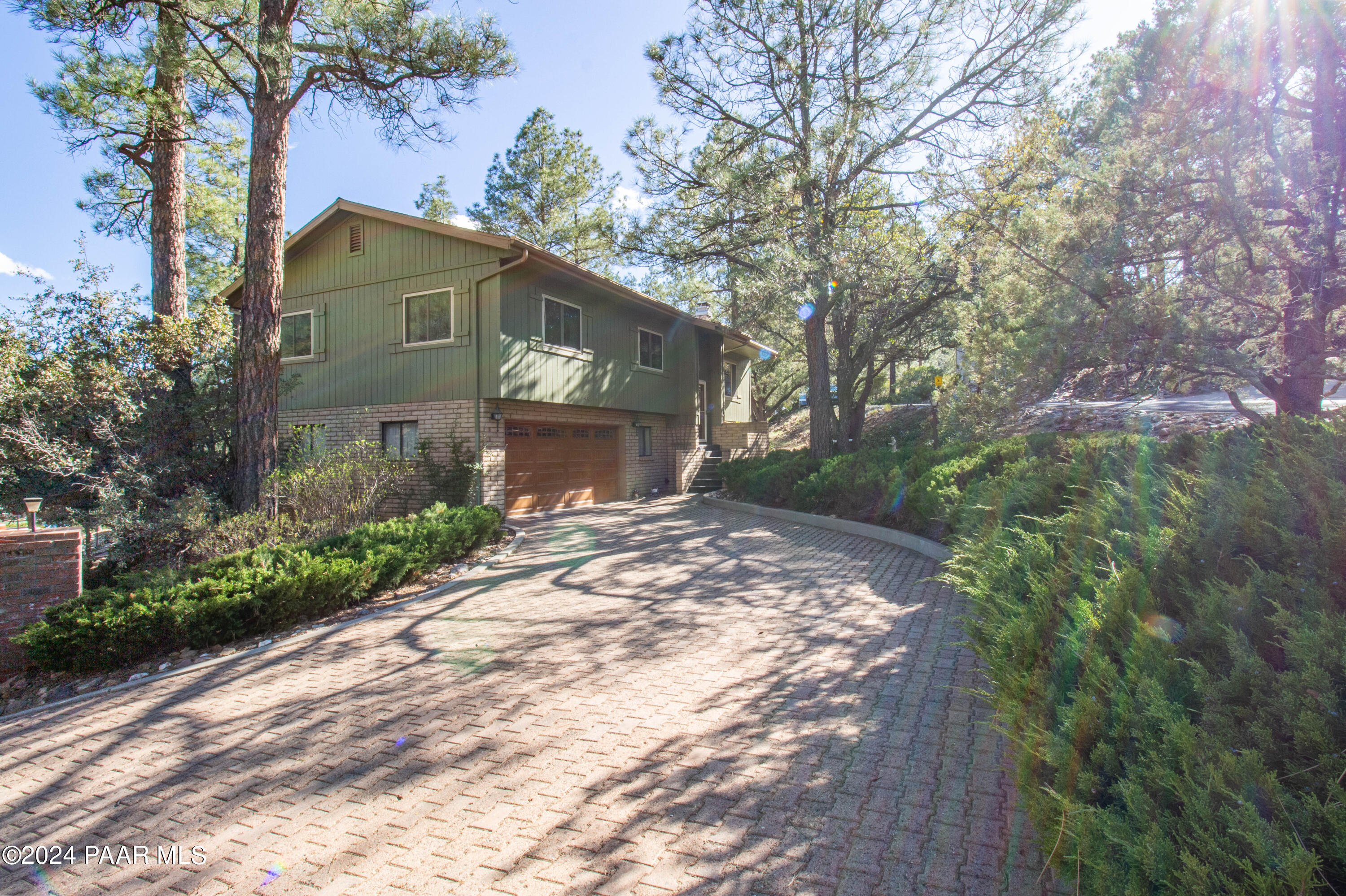 481 Turtleback Road Prescott, AZ 86303 - Photo 71 of 71 a front view of a house with a yard and tree s