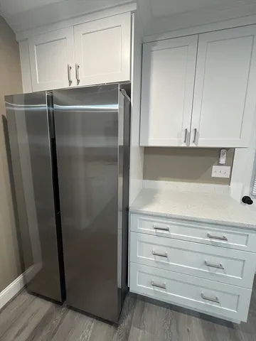 a view of a closet in a kitchen