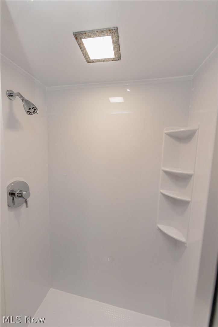 2444 Dysart Road Cleveland, OH 44118 - Photo 32 of 44 Bathroom with walk in shower and crown molding