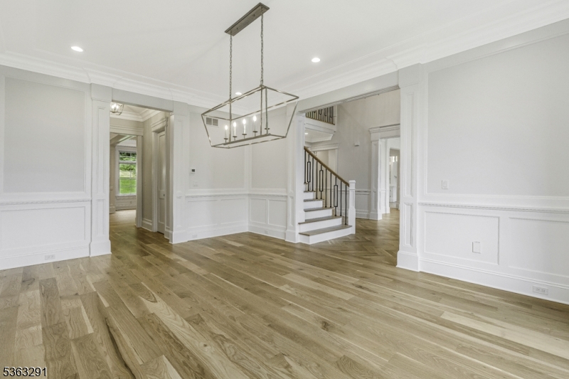 8 Cobblestone Court Warren, NJ 07059 - Photo 13 of 50 a view of empty room and wooden floor